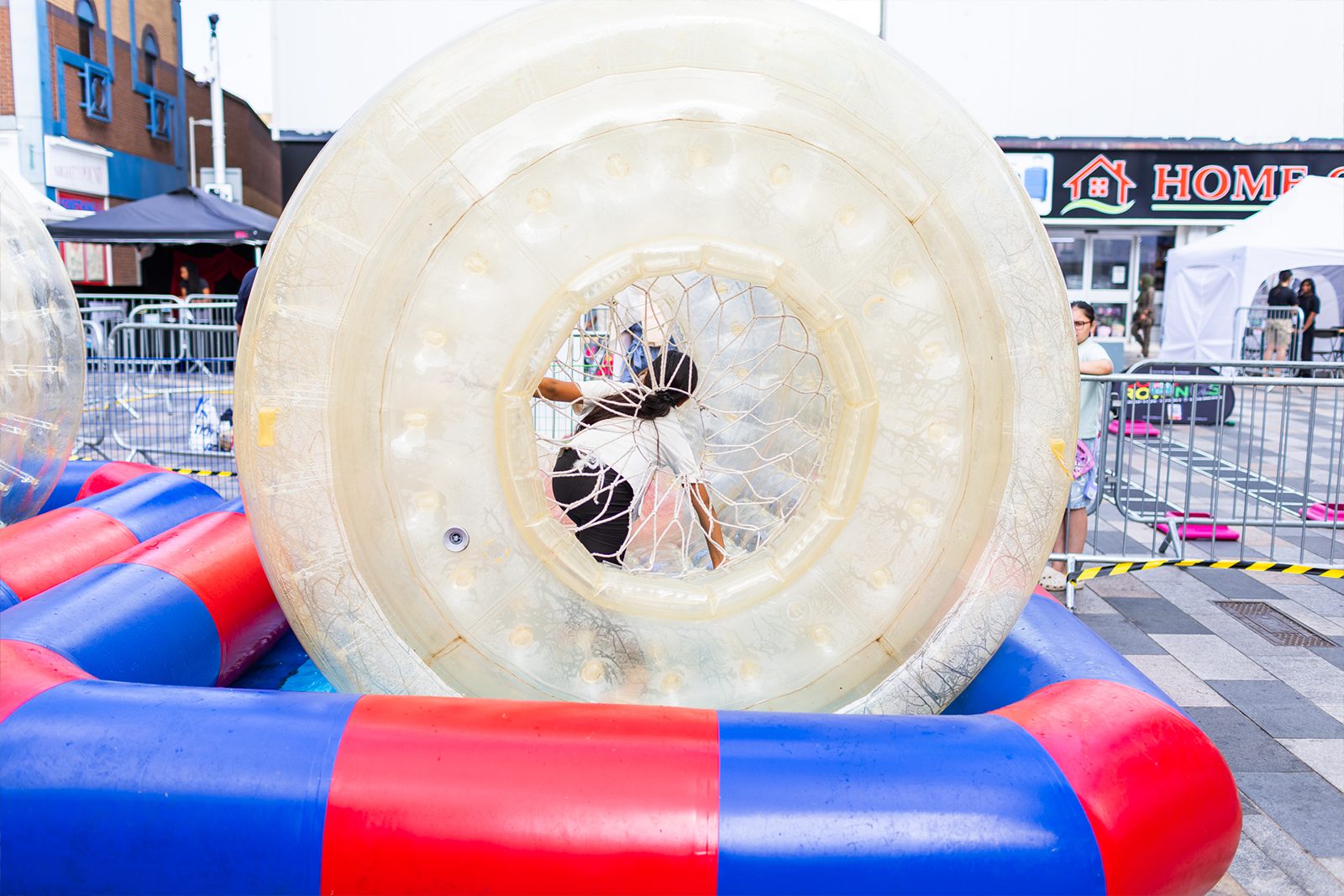 Water zorbing attraction with queues at Ilford inColour