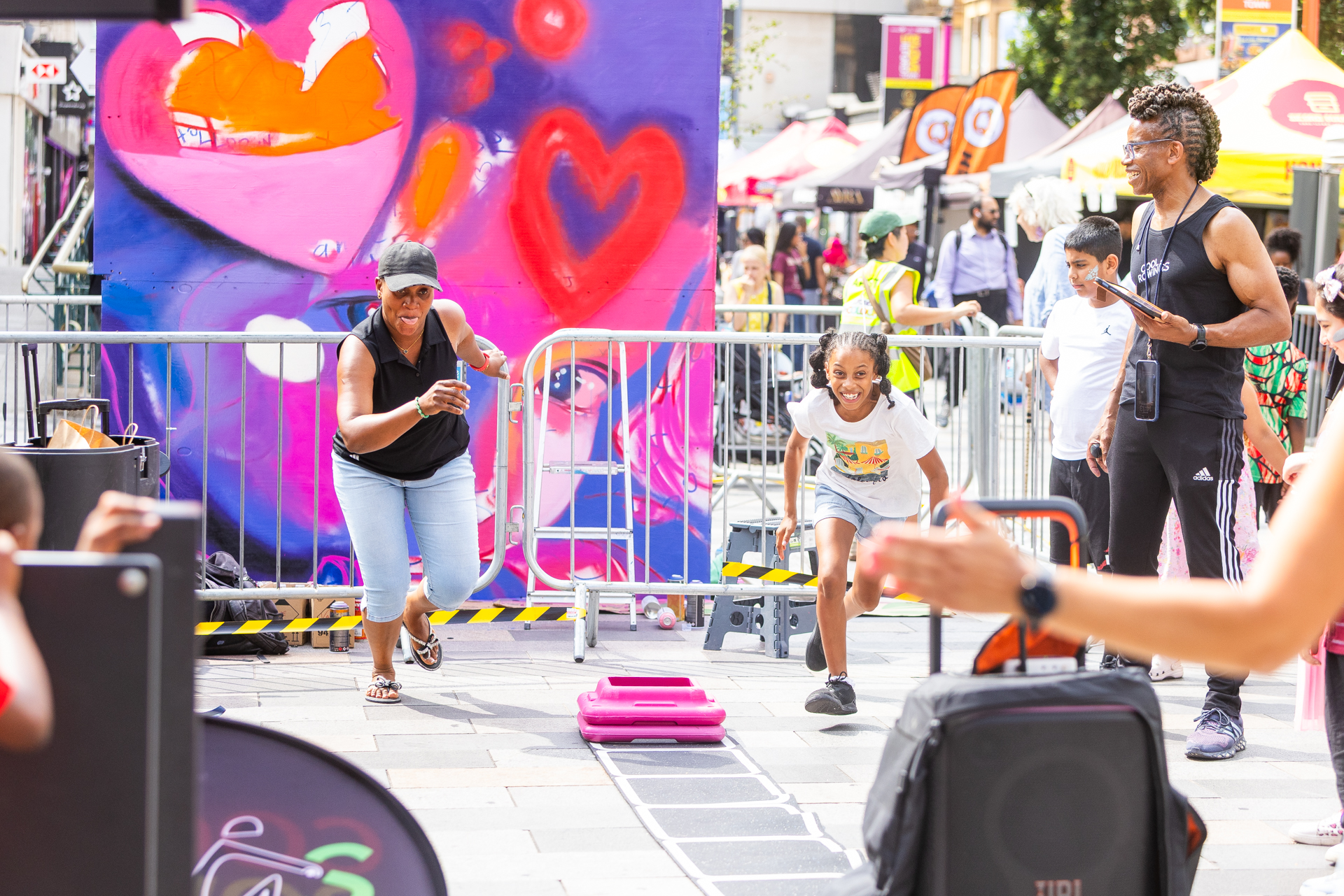 Families taking part in the Gladiator Experience on Ilford High Road
