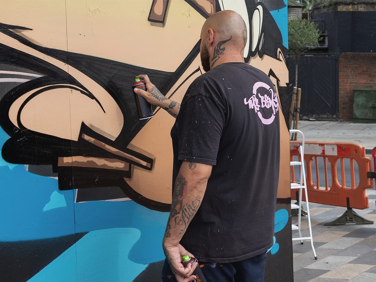 Artist at work on the Bodgers site during Ilford inColour